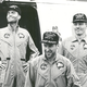 Haise, Lovell and Swigert exit a helicopter aboard the USS Iwo Jima (LPH-2) following splashdown in the Pacific Ocean (NASA)